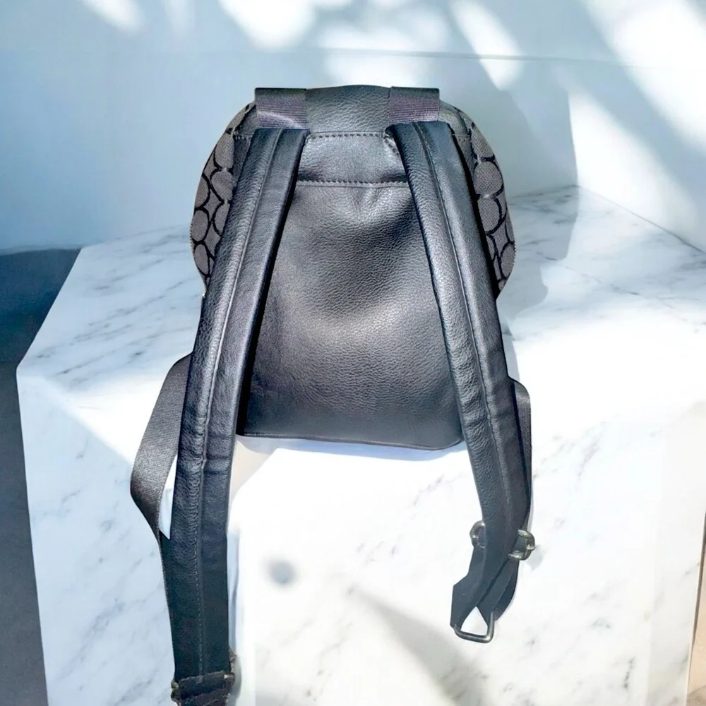 Chic & Compact: Nine West Taren Mini backpack Black logo canvas & leather